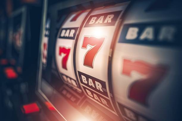 Live Sic Bo table with professional croupier and dice cage on mobile screen